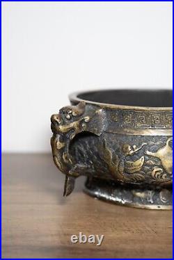 A Chinese Bronze Incense Burner with Dragon Details 14cm Diameter