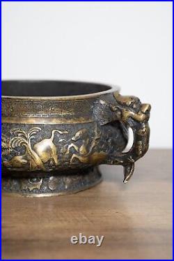 A Chinese Bronze Incense Burner with Dragon Details 14cm Diameter