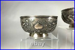 A Fine Antique Pair of Signed Chinese Silver Dragon Bowls