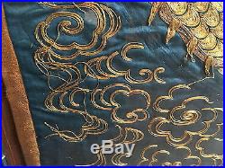 A Framed Antique Chinese Embroidery Dragon Panel