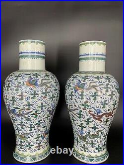 A Pair Of Chinese Wucai'dragon And Phoenix' Vases