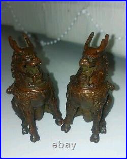 A Stunning Pair Of chinese bronze Dragons incense burners