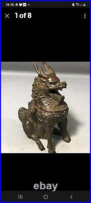 A Stunning Pair Of chinese bronze Dragons incense burners