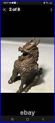 A Stunning Pair Of chinese bronze Dragons incense burners