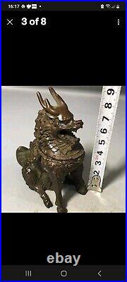 A Stunning Pair Of chinese bronze Dragons incense burners