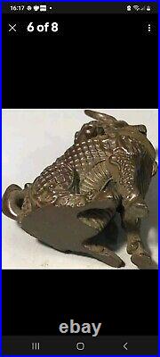 A Stunning Pair Of chinese bronze Dragons incense burners