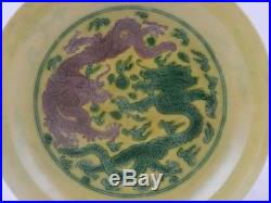 A small antique Chinese yellow glazed porcelain dragon dish, Yung-Ch'eng mark