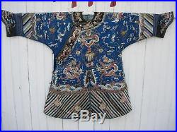 An Antique Chinese Embroidered Blue Silk Dragon Robe