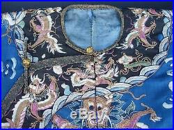 An Antique Chinese Embroidered Blue Silk Dragon Robe