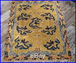 ANTIQUE CHINESE TIBETAN DRAGON RUG An exceptional rug frm Tibet 5 ft x 7 ft 2 in