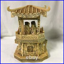 Antique Bone Asian Pagoda with a couple figurines