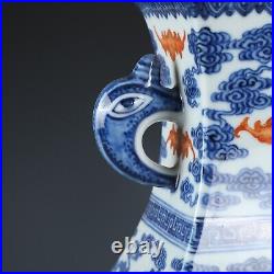 Antique Chinese Qianlong blue white alum red dragon and pattern dove ear statue