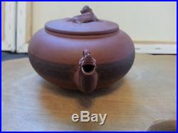 Antique Chinese Yixing zisha clay teapot with dragon motif