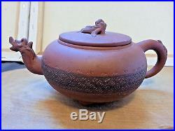 Antique Chinese Yixing zisha clay teapot with dragon motif