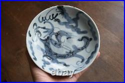 Antique Chinese blue & white dish with Dragon over the wall design, Dehua Kiln