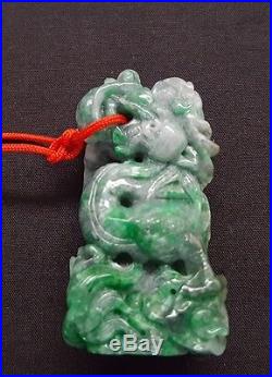 Antique Chinese hand carved jade dragon pendant