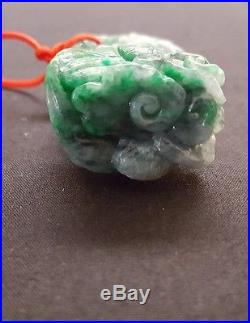 Antique Chinese hand carved jade dragon pendant