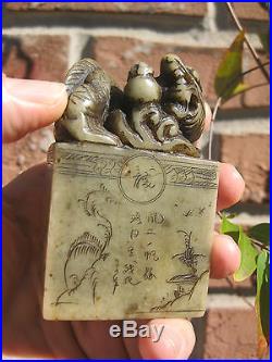 Antique soap stone dragon statue with carvings and Chinese characters, signed