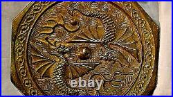 Archaic Chinese Eight-sided Bronze Mirror With Embossed Winged Twin Dragons