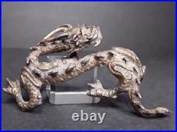 Chinese cast pewter and gilt dragon Scholars paper weight