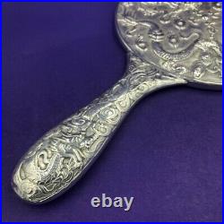 Chinese export dragon decorated silver ladies hand mirror Circa 1900