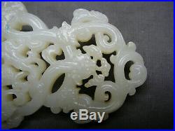 Extremely rare highly important Chinese white jade 9-dragon pendant 18/19thC