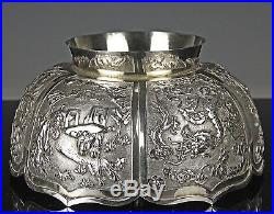 LARGE ANTIQUE CHINESE SILVER RELIEF DECORATED BOWL WITH DRAGONS AND FIGURES