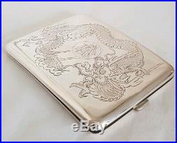 Late C19 Chinese Export silver case. Decorated in relief with Dragons. By Zee Wo