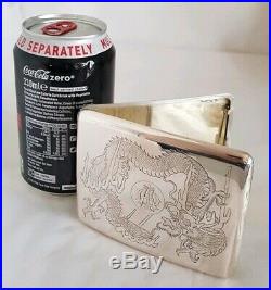 Late C19 Chinese Export silver case. Decorated in relief with Dragons. By Zee Wo
