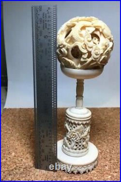 Vintage Chinese carved Dragon Puzzle ball with stand